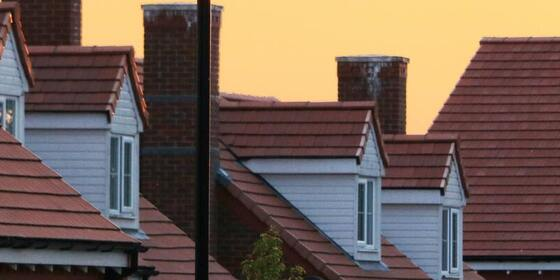 Rows of houses with different roof and building features